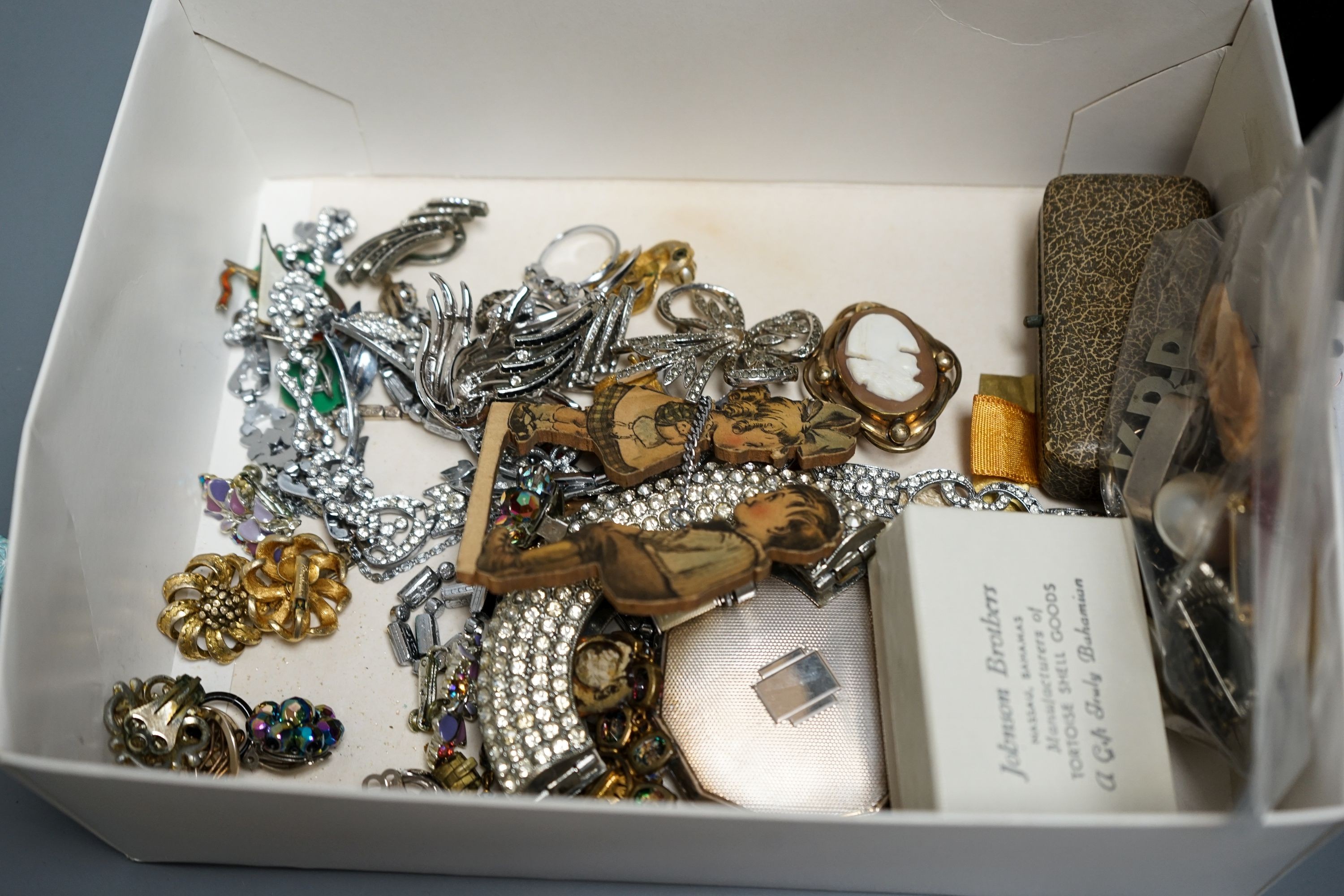 A pair of white metal and two colour enamel cufflinks and a quantity of assorted costume jewellery.